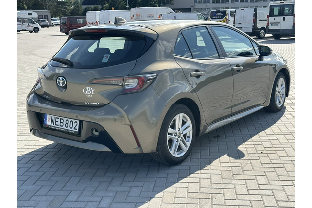 Toyota Corolla rental car dashboard and steering wheel